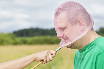 Image showing Caught man with a butterfly net