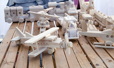 Image showing wooden handmade plane helicopter toy models store 