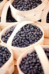 Image showing healthy fresh blueberries macro closeup on market outdoor