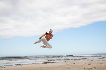 Image showing man is jumping sport karate martial arts fight kick