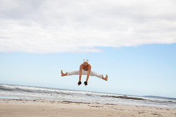 Image showing man is jumping sport karate martial arts fight kick