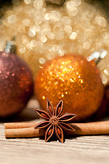 Image showing anice cinnamon and bauble christmas decoration in gold