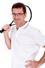 Image showing smiling adult tennis player with racket isolated