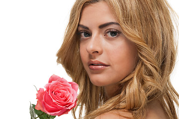 Image showing attractive young smiling woman with flowers roses isolated