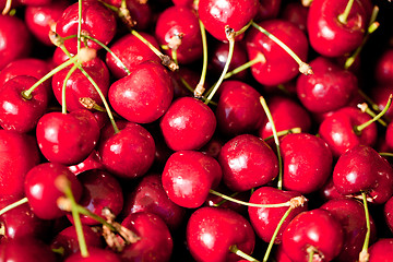 Image showing sweet red cherry closeup macro on market outdoor