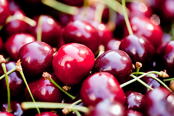 Image showing sweet red cherry closeup macro on market outdoor