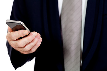 Image showing adult businessman with smartphone mobilephone isolated