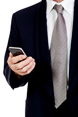 Image showing adult businessman with smartphone mobilephone isolated