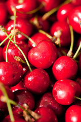 Image showing sweet red cherry closeup macro on market outdoor