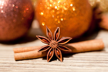 Image showing anice cinnamon and bauble christmas decoration in gold