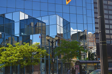 Image showing Reflections in glass buildings.