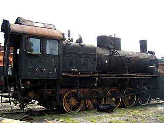 Image showing Ancient black steam locomotive