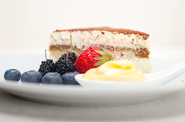 Image showing tiramisu dessert with berries and cream