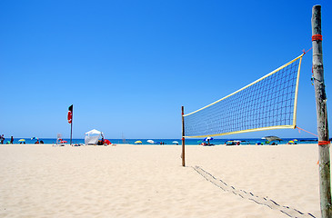 Image showing Beach Volleyball net on sandy beach 