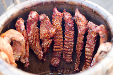 Image showing grilled pork ribs on bbq grill with a shallow DOF