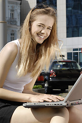 Image showing happy student with laptop