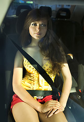 Image showing woman fastened by seat belt