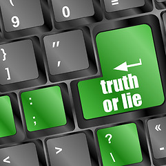 Image showing truth or lie button on computer keyboard key