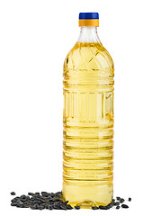 Image showing Bottle of sunflower oil and seeds near