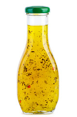 Image showing Glass bottle with italian sauce