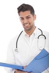 Image showing Doctor looking at patient records on a ward round