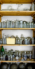 Image showing Photo of an old laboratory with a lot of bottles