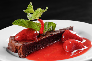 Image showing Chocolate cake with strawberry and chili