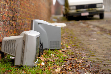 Image showing Used compöuter displays on the ground