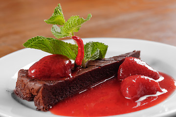 Image showing Chocolate cake wth strawberry and chili