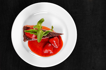 Image showing Chocolate cake wth strawberry and chili