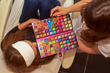 Image showing Large makeup palette used by an makeup artist