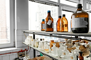 Image showing Photo of an old laboratory with a lot of bottles