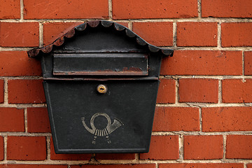 Image showing Vintage postbox on brick wall