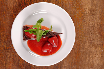 Image showing Chocolate cake with strawberry and chili