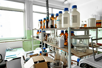 Image showing Photo of an old laboratory with a lot of bottles