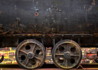 Image showing Wheels of a mine cart