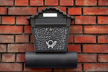 Image showing Vintage postbox on brick wall