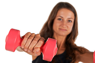 Image showing Weights in the hands of a young woman