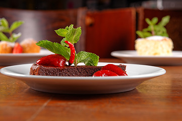 Image showing Chocolate cake wth strawberry and chilli