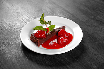 Image showing Chocolate cake wth strawberry and chilli