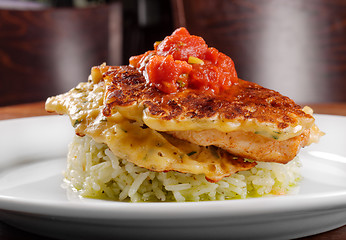 Image showing Fried chicken ribs and rice with tomato sauce