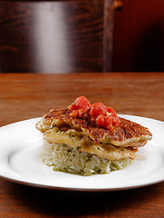 Image showing Fried chicken ribs and rice with tomato sauce