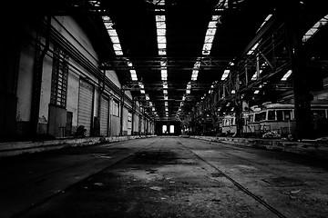 Image showing Interior of a vehicle repair station in black and white