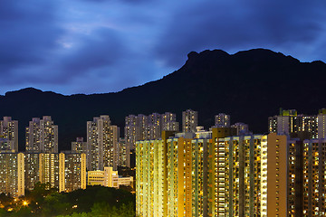 Image showing Hong Kong cityscape with lion rock mountain