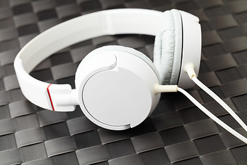 Image showing Headphone on black mat