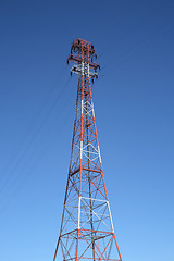 Image showing Top of the red and white electricity pylon