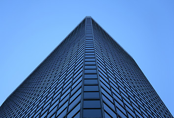 Image showing Angle view of a glass-windowed office tower