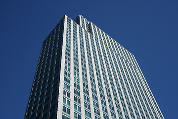 Image showing Top of the gray office building