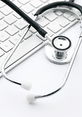 Image showing Stethoscope on the keyboard