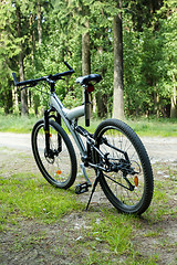 Image showing detail of bike parked in a country road